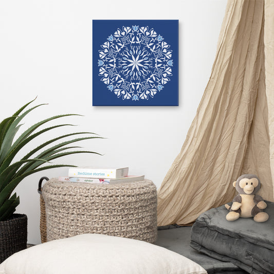 This image is of a canvas print designed and sold by New Wing Studio and features Mandala art inspired by the Bible verse “Be still, and know that I am God” Psalm 46:10. The words “be still” are hidden in this mandala 16 times. The print features a deep blue background with a white and light blue mandala floral design. The art is created by Jennifer Knight, NewWingStudio.com