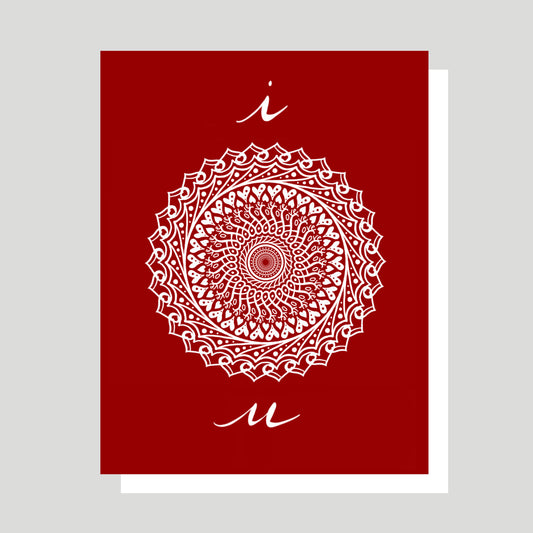 The Greeting card in this image is intended to convey the message that you love the person receiving the card.  It communicates this message in unique, beautiful, and meaningful way because the card features a white Mandala set on a deep red background with the word “Love” repeated throughout the design 39 times.  This card can be given on any occasion.  The card is blank inside for room to write a personalized note.  The Hidden Word art is created by Jennifer Knight.  NewWingStudio.com